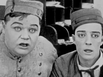 Roscoe "Fatty" Arbuckle and Buster Keaton in a scene from the 1918 silent comedy The Bell Boy.