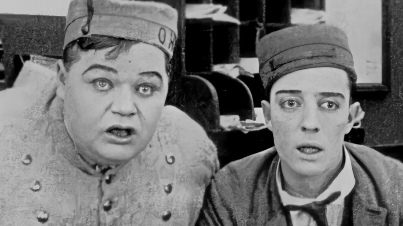 Roscoe "Fatty" Arbuckle and Buster Keaton in a scene from the 1918 silent comedy The Bell Boy.